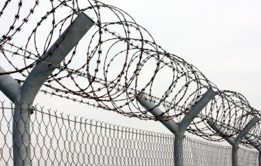 Fence with a barbed wire clipart