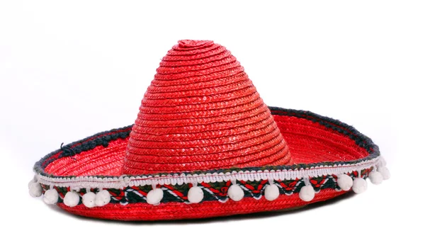 Un sombrero mexicano rojo sobre un fondo blanco . —  Fotos de Stock