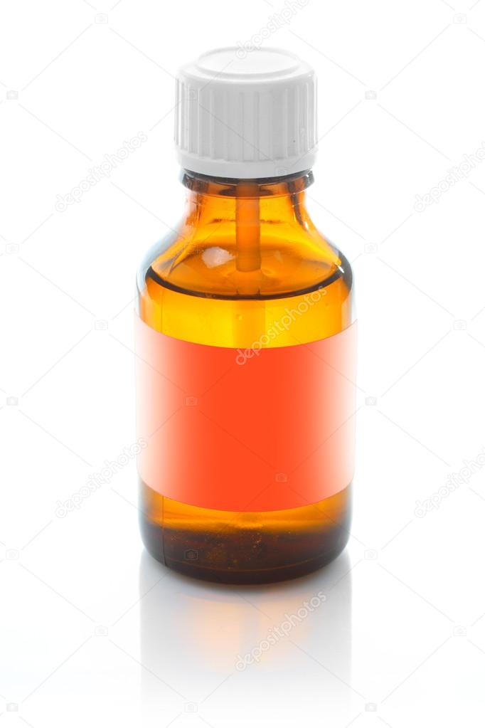Brown medicine bottle with an empty label.