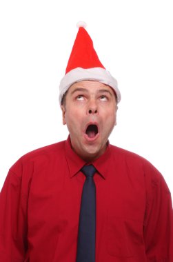 Noel Baba şapkası ile mutlu işadamı.