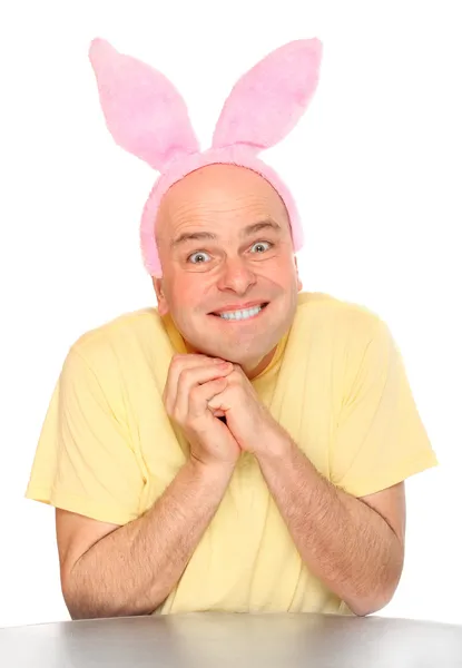 Funny picture of an happy man with pink rabbit ears — Stock Photo, Image