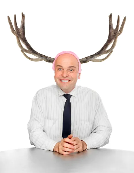 Funny picture of an stupid manager (husband) with great antlers — Stock Photo, Image