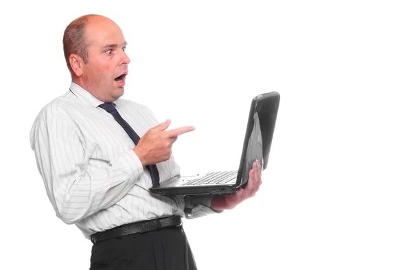 Frustrated businessman with laptop — Stock Photo, Image