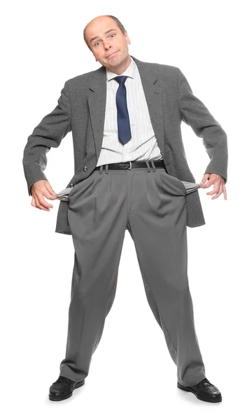 Businessman holding his two empty pockets. Crisis metaphor. — Stock Photo, Image
