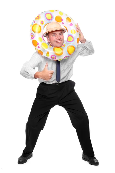 Happy businessman going on vacation with his life ring. Travel insurance metaphor. — Stock Photo, Image