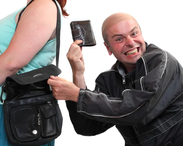 Dief stelen van handtas van een vrouw. verzekering concept. — Stockfoto
