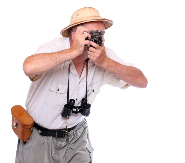 Fotógrafo com câmera vestida de terno para destino tropical — Fotografia de Stock