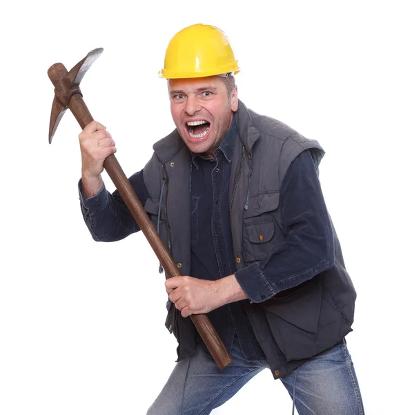 Mannelijke bouwvakker met pick bijl op een witte achtergrond. — Stockfoto