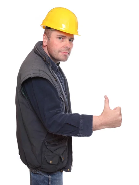 Worker wearing a helmet isolated on a white background. with thumbs up — Stock Photo, Image