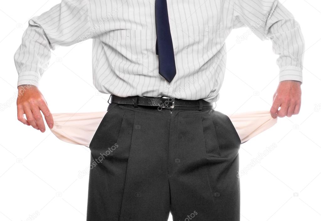 Businessman holding his two empty pockets. Bankruptcy concept