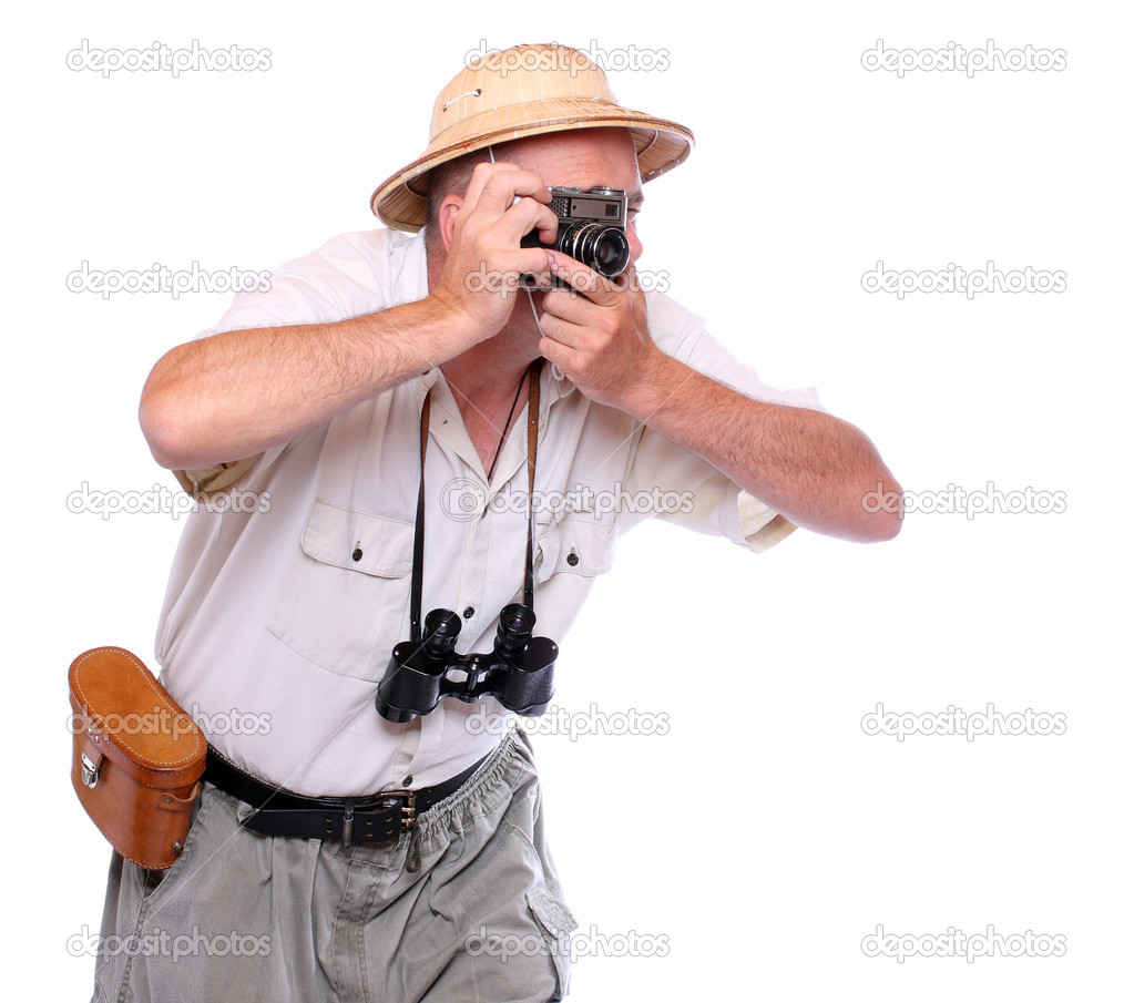 Photographer with camera dressed on suit for tropical destination