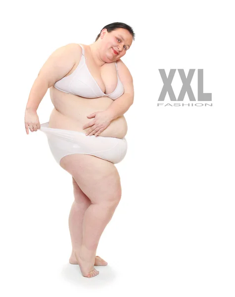 太りすぎの女性はビキニに身を包んだ — ストック写真