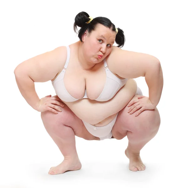 Overweight woman dressed in swimsuit — Stock Photo, Image