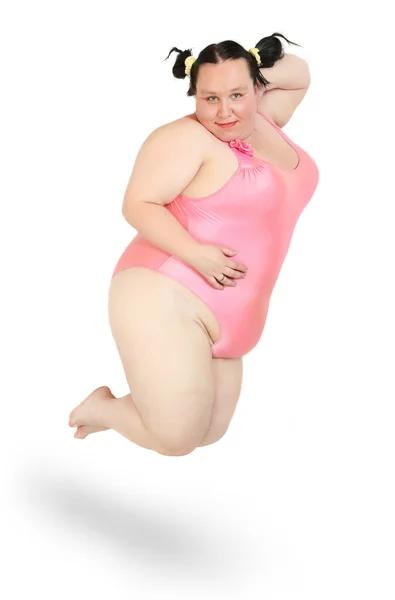 Mulher com excesso de peso vestida de maiô em um fundo branco . — Fotografia de Stock