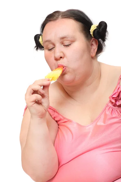 Overweight woman with sweet ice lolly. — Stock Photo, Image