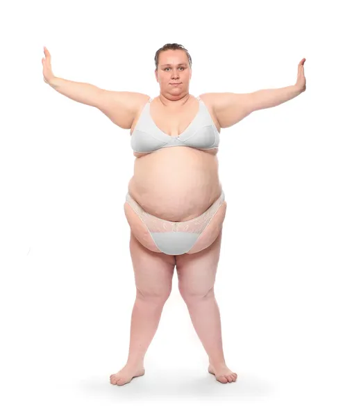 Overweight woman exercising. — Stock Photo, Image