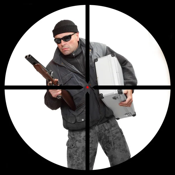 Dangerous gangster or terrorist in a police sniper's scope. — Stock Photo, Image