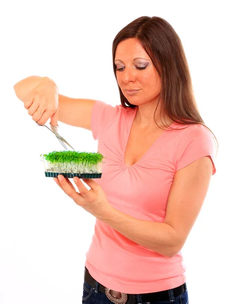 Frau mit grünen Pflanzen und Schere — Stockfoto