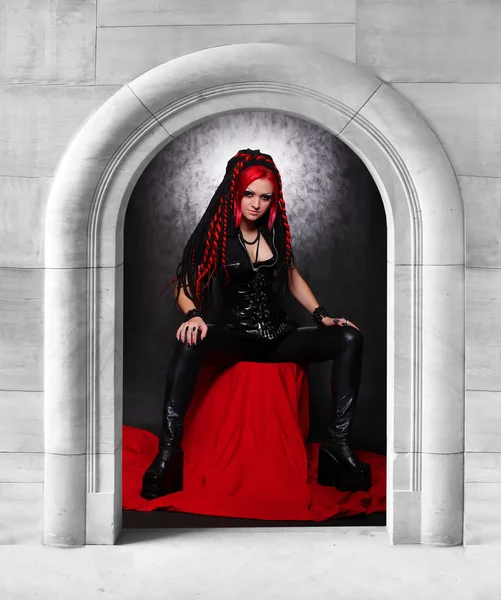 Bizarre red hair Gothic Girl in stone dungeon. — Stock Photo, Image