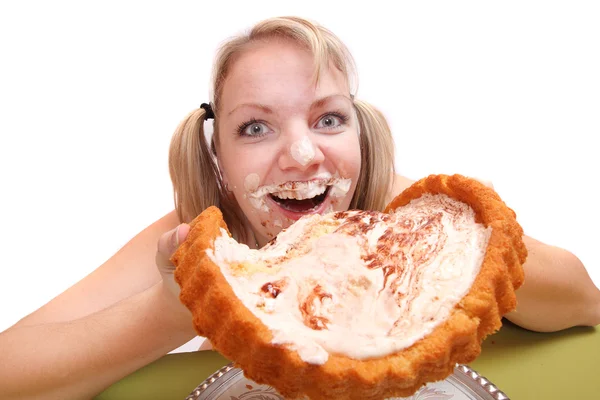 La fille gourmande mange une tarte sucrée — Photo