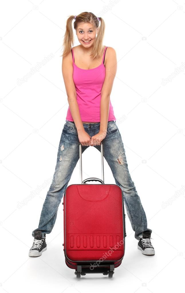 Young woman going to holidays with her suitcase.