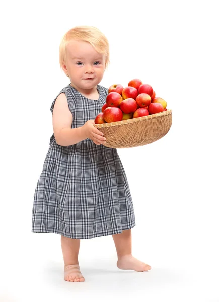 Farmer girl and full wicker basket of fresh ripe apples. Harvest concept. — Stock Photo, Image