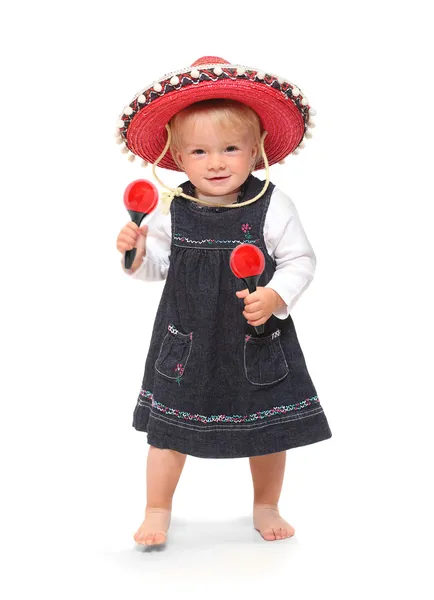 Little girl singing and dancing in the mexican sombrero — Stock Photo, Image