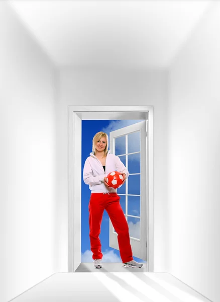 Sporty girl with soccer ball — Stock Photo, Image