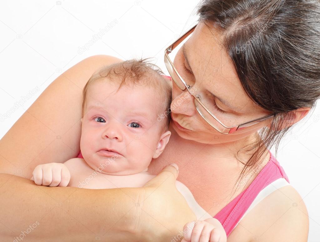 Young mother and her crying baby.