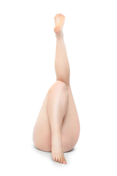 Naked woman's legs over white — Stock Photo, Image