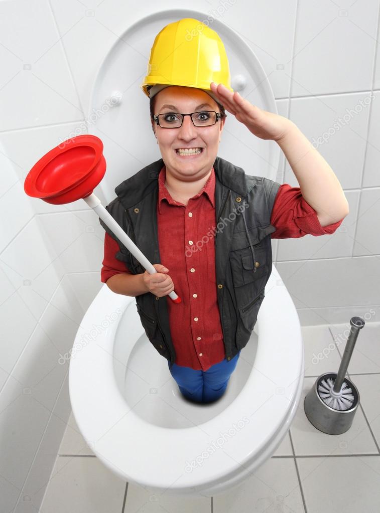 Funny repairwoman with red toilet plunger cleaning the toilet bowl. Stock Photo by ©vladvitek 32746695 Funny repairwoman with red toilet plunger cleaning the toilet bowl. Stock Photo by ©vladvitek 32746695