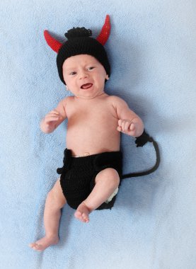 moda fotoğraf ile sevimli bir bebek, komik kostüm karnaval için örme