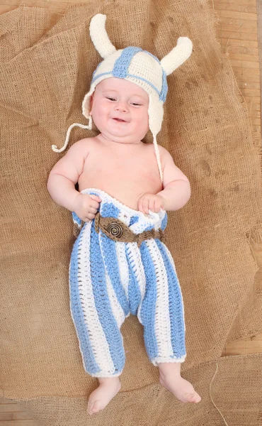 Little viking in handmade knitted costume. — Stock Photo, Image