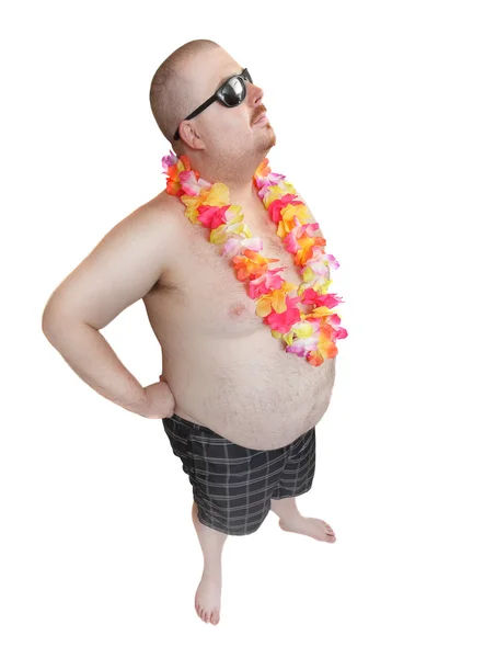 Overweight man in swimsuit with flowers necklace — Stock Photo, Image