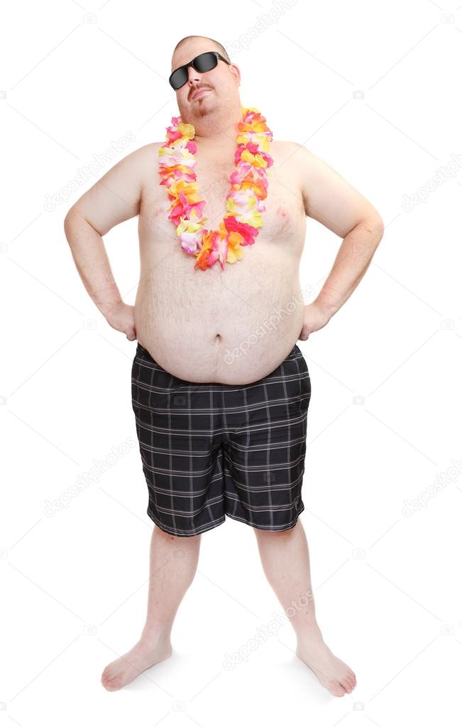 Overweight man in swimsuit with flowers necklace