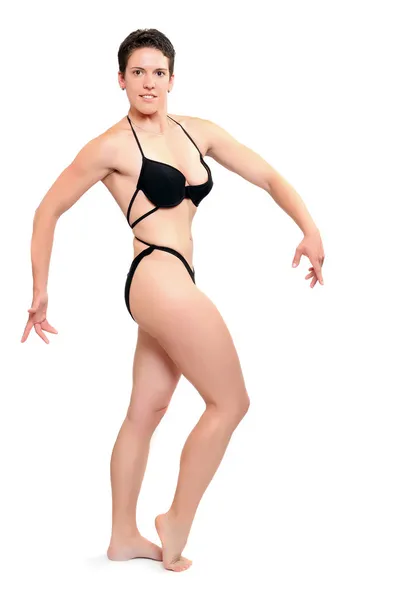 Body builder woman posing on a white background. — Stock Photo, Image