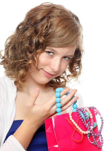 Happy girl with her christmas gift, costume jewelry — Stock Photo, Image