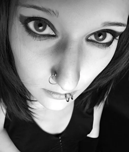 Monochrome low key portrait of attractive gothic woman with big eye. — Stock Photo, Image