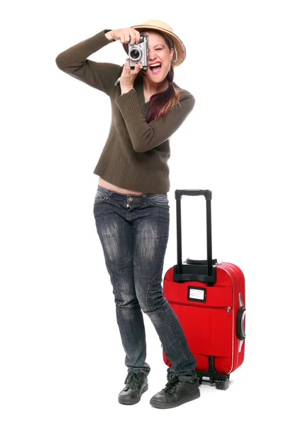 Happy traveler with camera and suitcase going on vacation. — Stock Photo, Image