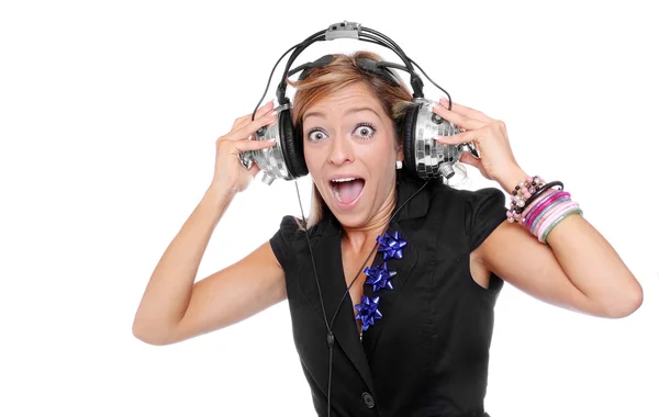 Girl enjoys listening music in headphones — Stock Photo, Image