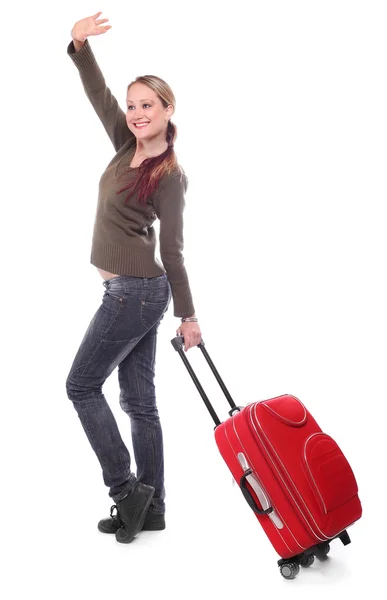 Young woman going on vacation with her suitcase. Stock Picture