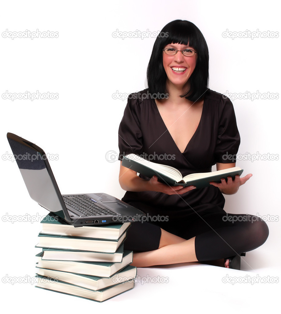 Portrait of a attractive business girl working on notebook.