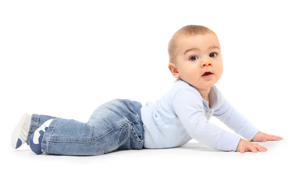 Grappige peuter jongen spelen op een witte achtergrond. — Stockfoto