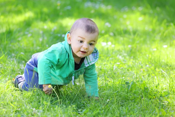 Little child playing outdoors — Stock Photo, Image