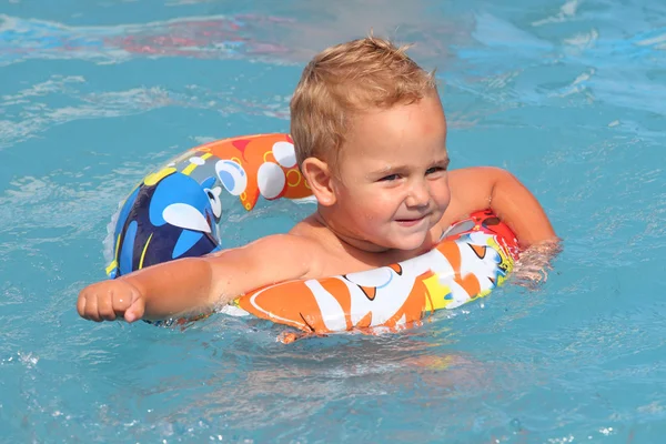 Boy swimming in ring. — Stock Photo, Image