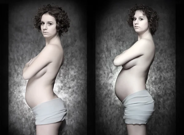 Schöne schwangere Frau auf schwarzem Hintergrund. Studioaufnahme. — Stockfoto