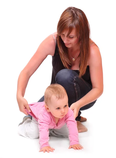 Ung mor och hennes barn. — Stockfoto