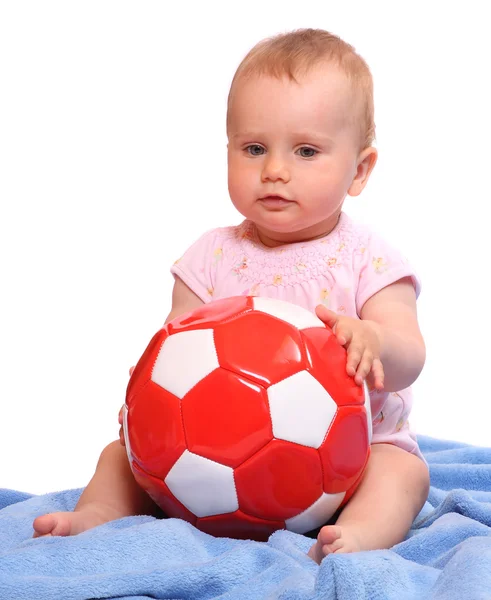 Little child sitting on a white background. — Stock Photo, Image