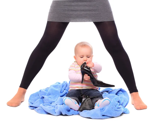 Young successful businesswoman with here little baby. Feminist metaphor. — Stock Photo, Image