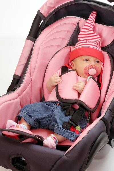 Baby in safety seat. Safety and insurance concept — Stock Photo, Image